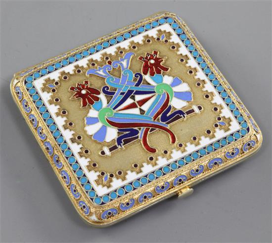 A late 19th century Russian 84 zolotnik silver gilt and cloisonne polychrome enamel cigarette case, 83mm.